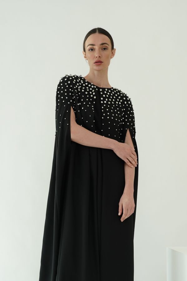 Black cape with stones