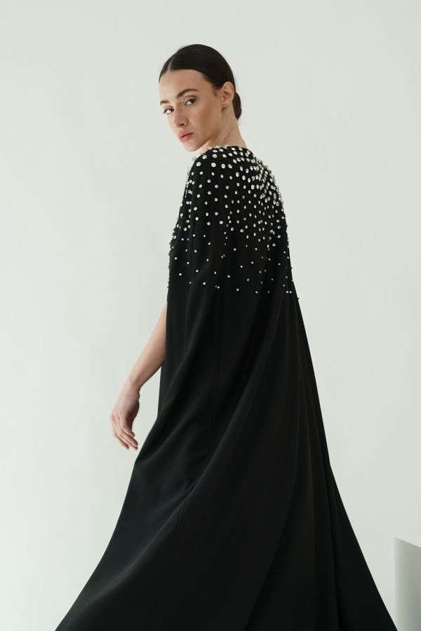 Black cape with stones