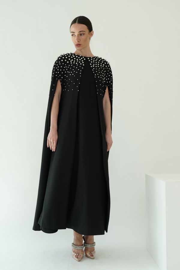 Black cape with stones