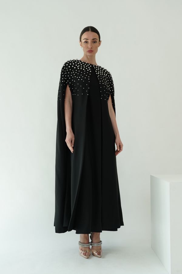 Black cape with stones